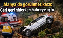 Alanya'da görünmez kaza: Geri geri giderken bahçeye uçtu