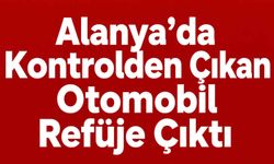 Alanya’da kontrolden çıkan otomobil refüje çıktı