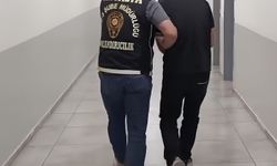 Antalya'da dolandırıcılık şüphelisi bankada para çekerken suçüstü yakalandı