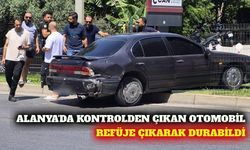 Alanya'da otomobil refüje çıktı: Yaralanan yok