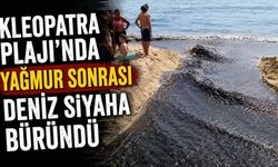 Kleopatra Plajı’nda yağmur sonrası deniz siyaha büründü