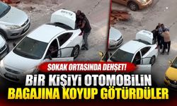 Sokak ortasında dehşete düşüren olay! Bir kişiyi otomobilin bagajına koyup götürdüler