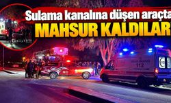 Serik'te korku dolu anlar! Sulama kanalına düşen araçta mahsur kaldılar