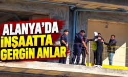 Alanya'da parasını alamayan işçi inşaatın balkonuna çıktı