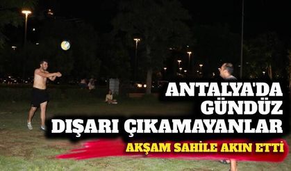 Antalya'da gündüz dışarı çıkamayanlar, akşam sahile akın etti