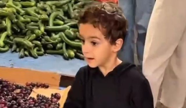 Alanyalı DMD hastası Taha Miraç kumbarasıyla pazarda umut topluyor