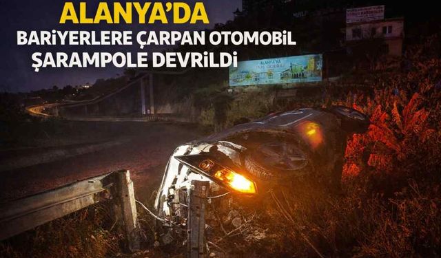 Alanya’da bariyerlere çarpan otomobil şarampole devrildi