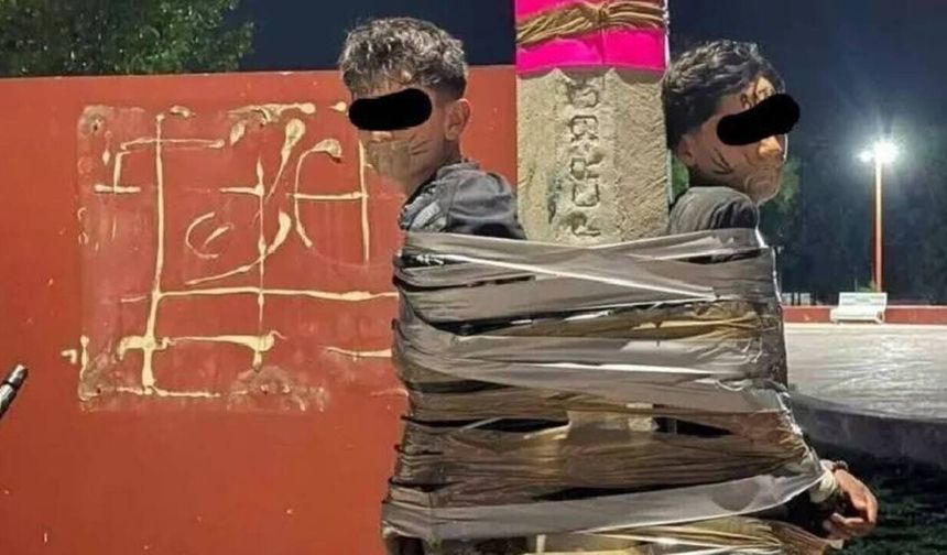 Meksika'da hırsızları direğe bağlayan Batman aranıyor