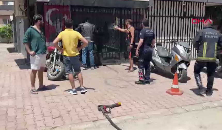 Muratpaşa'da üzerine benzin döküp iş yerine kilitlendi
