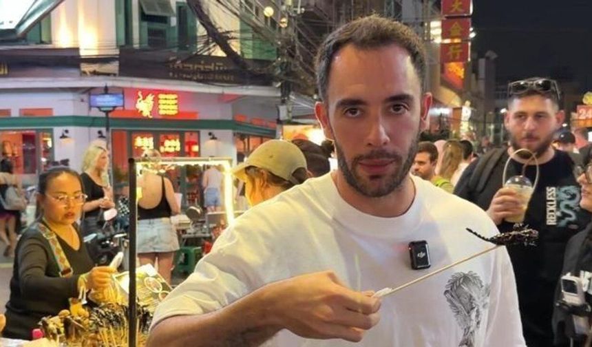 Çin'de akrep menüsü ve Antalya'da yılanla oynayan kedi