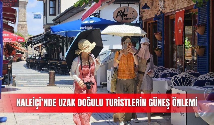 Kaleiçi'nde Uzak Doğulu turistlerden sıkı güneş önlemi