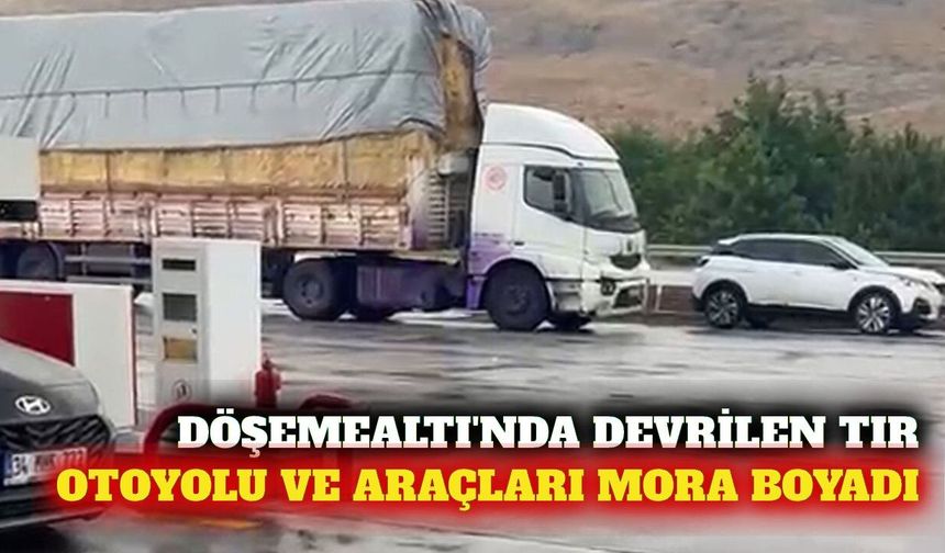 Döşemealtı'nda devrilen boya yüklü tır araçları mora boyadı