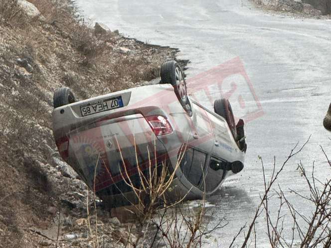Alanya Kuşyuvası'nda korku dolu anlar: Karlı yolda araç takla attı